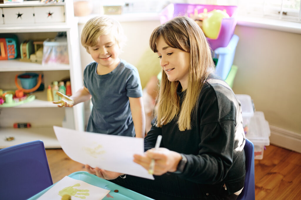 drawing-activity-mother-and-child-at-home-with-ha-