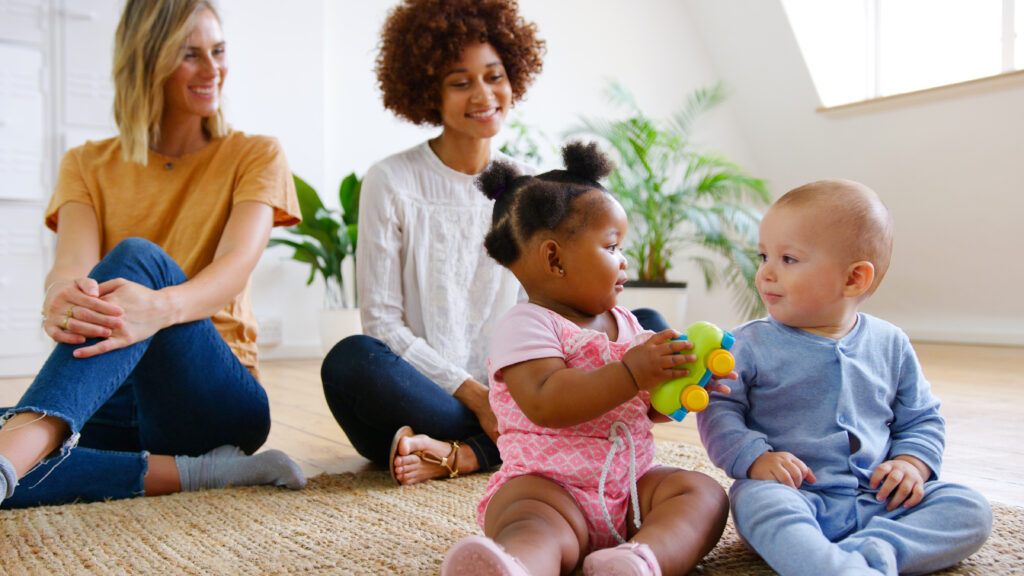 two-mothers-meeting-for-play-date-with-babies